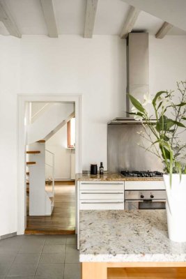 Urbanes Maisonette-Penthouse mit Turmzimmer, Bulthaup Küche und Skyline-Blick