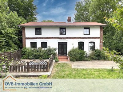 Vielseitiges Haus mit Einliegerwohnung, Stall und Lagerhalle