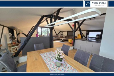 Großzügige Dachgeschosswohnung mit Gartenanteil