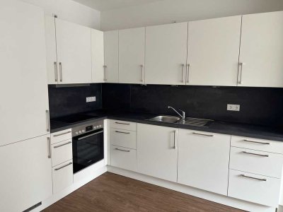 Heiligkreuzviertel: Dreizimmerwohnung mit EBK, Balkon und Stellplatz