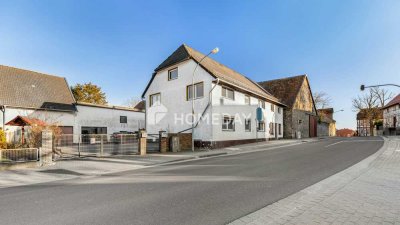 Vielseitiges Zweifamilienhaus mit großzügigem Grundstück und massivem Nebengebäude