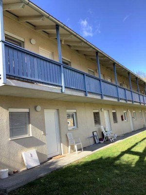 Sonnige Singlewohnung mit Gartenanteil