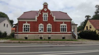 Attraktives sanierungsbedürftiges Wohn - und Geschäftshaus