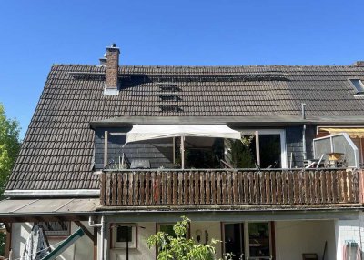 Freundliche Maisonette Wohnung mit Terrasse, Hobbyraum und Gartenmitnutzung