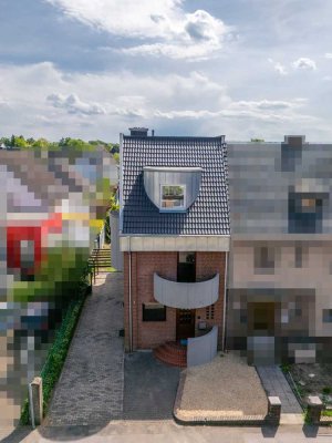 Langenfeld-City: 
Modernisierte Doppelhaushälfte mit viel Platz und Sonnengrundstück