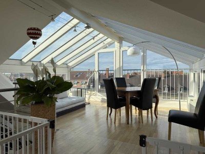 Sonne, Mond und Sterne – DG-Maisonette-Wohnung mit gläsernem Dachaufbau
