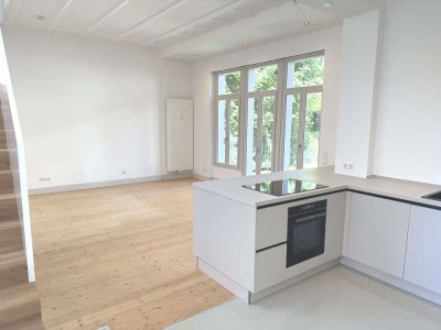 Haus im Haus mit Gartenidylle – Maisonette-Rarität im ruhigen Innenhof