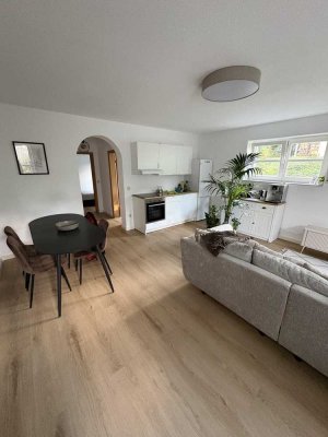 Frisch renovierte 2,5-Zimmer-Souterrain-Wohnung mit Carport & moderner Küche in Bad Rothenfelde