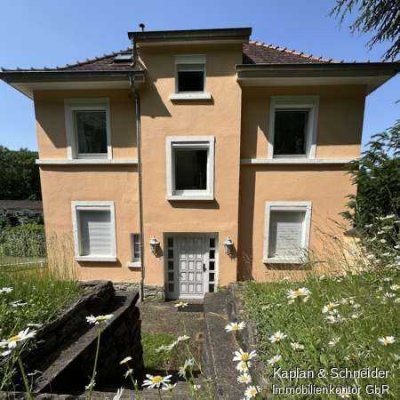Helles Ein-/Zweifamilienhaus mit Sanierungsbedarf in Waldrandlage von Eppstein