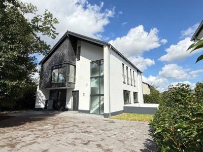 Architektonische Eleganz in Bestlage von Kaarst – Neubau-Stadtvilla mit Keller
