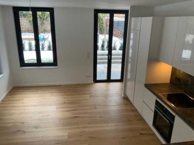 Charmante Maisonette-Neubauwohnung mit Terrasse und Einbauküche ( sowie Stellplatz bei Bedarf)
