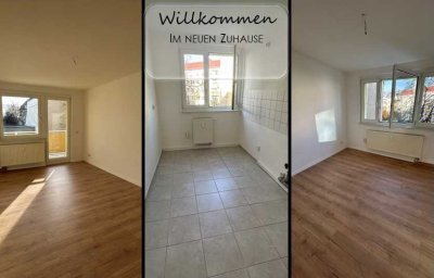 Wie wär's damit? Drei Zimmer-Wohnung mit Aufzug und Balkon