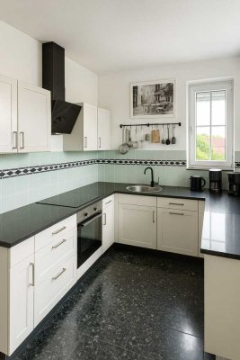 Helle Maisonette-Wohnung mit großzügigen Balkon & Parkplatz in zentraler Lage