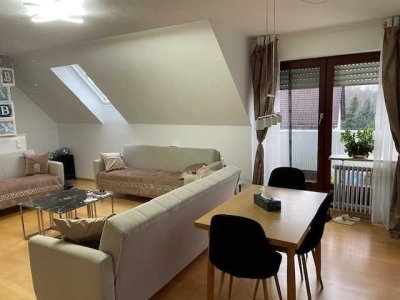 Brück Immobilien - Schöne, vermietete 3 Zi.-Maisonettewohnung mit Balkon