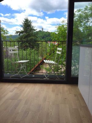 Lichtdurchflutete 3-Zimmer-Dachgeschosswohnung mit EBK und freier Aussicht
