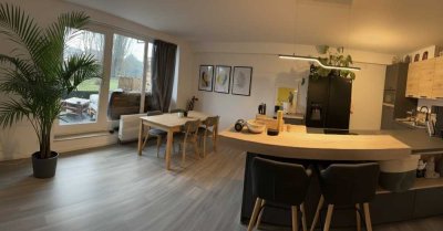Moderne 2-Zimmer-Wohnung im 1. OG mit Terrasse, hochwertiger Küche & Gemeinschaftsgarten