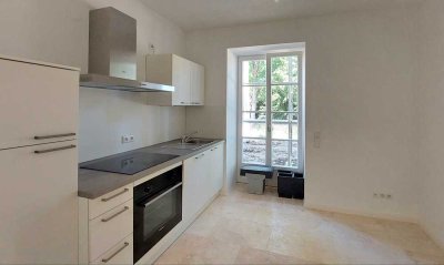 Erstbezug, 1 Zimmer, Terrasse, Fussbodenh.EBK und sehr geringe Nebenkosten!