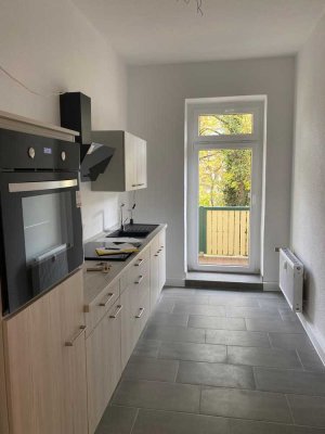 3-Raum-WE mit EBK & Balkon zum grünen Innenhof und großer Dusche in Stötteritz, Neuwertig