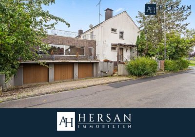 Haus mit Seltenheitswert: Dachterrasse, 3 Garagen & viel Potenzial in Jülich!