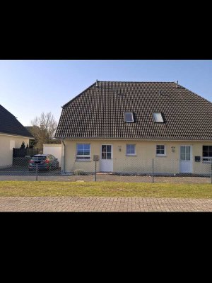 Komforthaushälfte mit kl. Grundstück