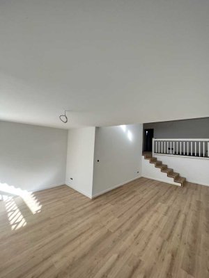 Zweitbezug nach Sanierung mit EBK, Terrasse und TG Stellplatz: freundliche 1,5-Zimmer-Wohnung in HD