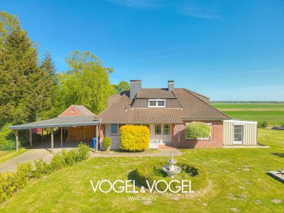 Ein Zuhause mit Weitblick – Familienidylle auf großem Grundstück mit viel Potenzial