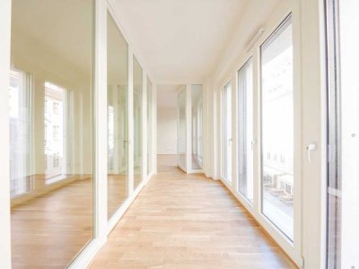Lichtdurchflutete 2-Zi.-Wohnung mit Wintergarten in bester Wohnlage *ERSTBEZUG*