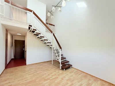 Charmante Maisonette-Wohnung auf Erbpachtgrundstück mit Tiefgaragenstellplatz