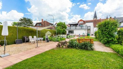 Exklusives Wohnen: Ihr neues Zuhause mit beeindruckender Dachterrasse und Gartenparadies