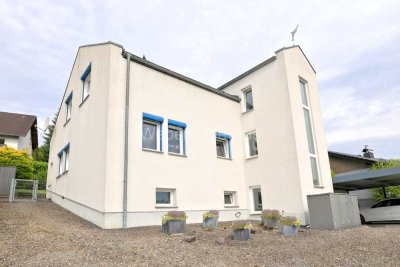 Wohnen am begehrten „Sonnenhang“: freistehendes, großzügiges Einfamilienhaus mit Terrasse + Garten