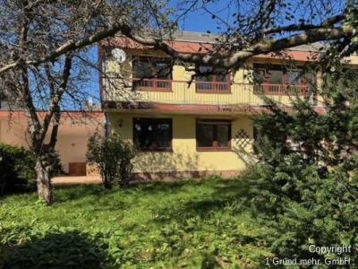 Ideal geschnittene 4-Zimmer-Erdgeschoss-Wohnung mit großem Garten in ruhiger Lage