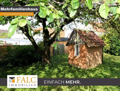 Mehrfamilienhaus mit Garagen
