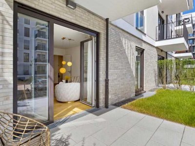 2-Zimmer-Erdgeschosswohnung mit Terrasse und Garten in modernem Wohnquartier