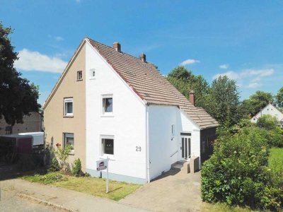 **Charmante Doppelhaushälfte in Herten-Scherlebeck – Ihr zukünftiges Projekt in der Ilsenstraße 29**