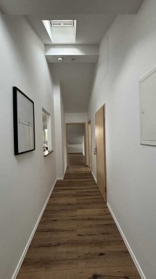 3-Raum-Dachgeschosswohnung mit großem Balkon in Grünlage