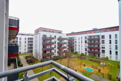 Wohnen mit Weitblick: elegante Etagenwohnung mit großzügigem Balkon und moderner Markenküche