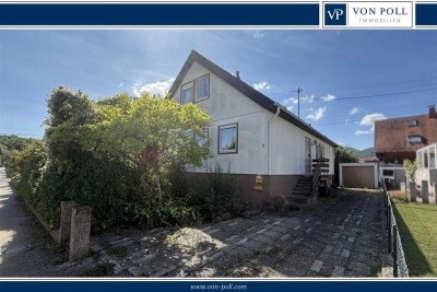 Gut geschnittenes Einfamilienhaus mit Garage in gewachsenem Wohngebiet