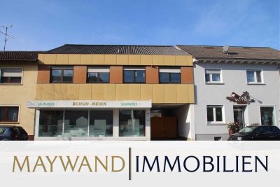 Zweifamilienhaus mit Ladengeschäft und Wohnung in attraktiver Lage