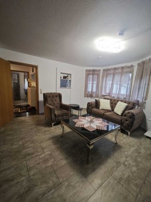 Charmante 3-Zimmer-Hochparterrewohnung mit Balkon, Garten & Garage