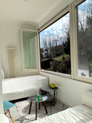 Großzügige 3,5-Zi. Wohnung mit Veranda & Blick ins Grüne