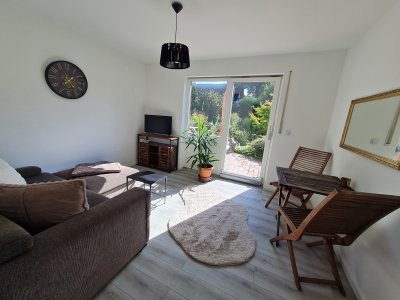 Helle 3-Zimmer Einliegerwohnung in charmantem Einfamilienhaus mit Traumgarten. benutzung.