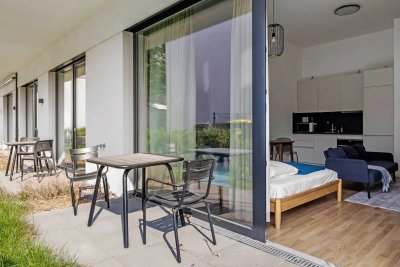 Helle Studio Gartenwohnung voll möbliert und einzugsbereit
